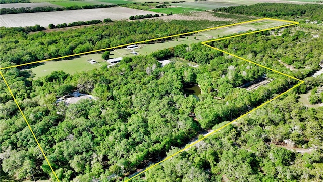 birds eye view of property featuring a rural view