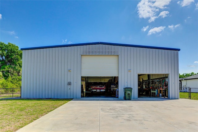 garage with a yard