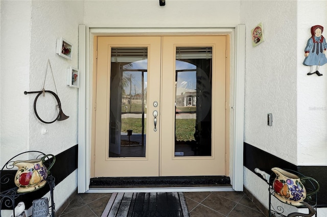 doorway to property with french doors