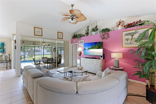 living room with lofted ceiling, light tile flooring, and ceiling fan