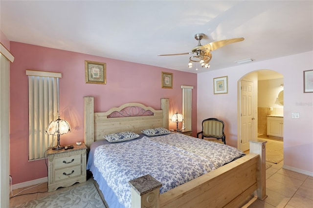 bedroom with light tile flooring and ceiling fan