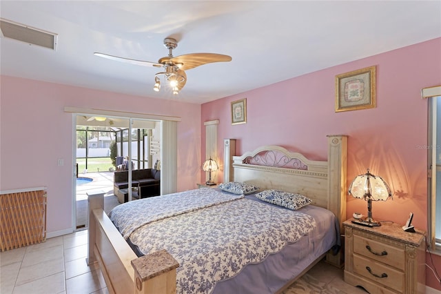 tiled bedroom featuring access to outside and ceiling fan