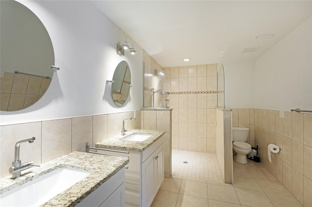 bathroom with backsplash, tile walls, toilet, and tile floors