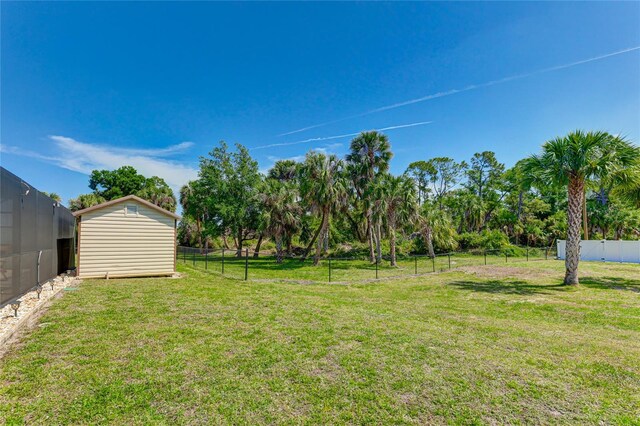 view of yard with a shed