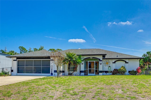 ranch-style home featuring a front lawn