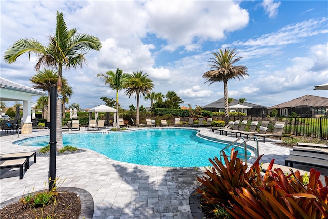 view of pool featuring a patio