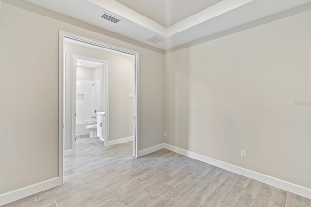 unfurnished room featuring light hardwood / wood-style floors