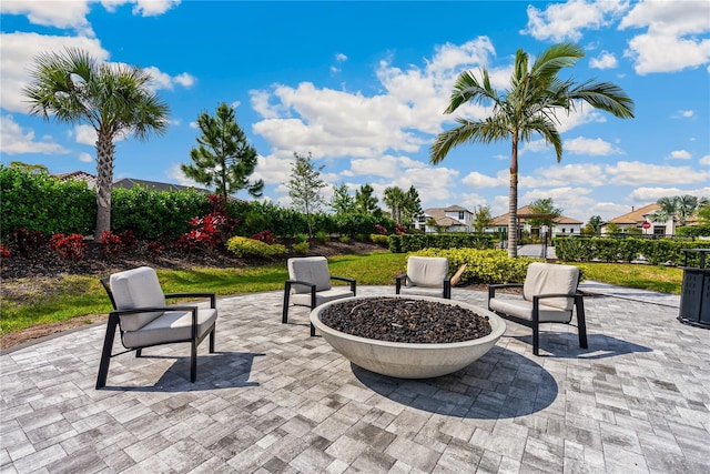 view of patio featuring an outdoor fire pit