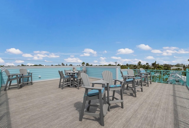 wooden deck with a water view