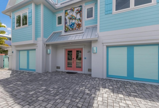 exterior space with french doors and a patio area