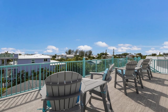 view of patio / terrace with a balcony