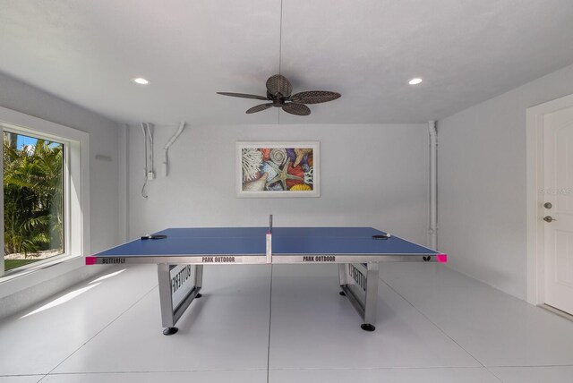 game room with tile patterned flooring and ceiling fan