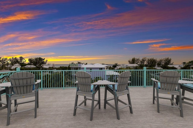 view of patio terrace at dusk