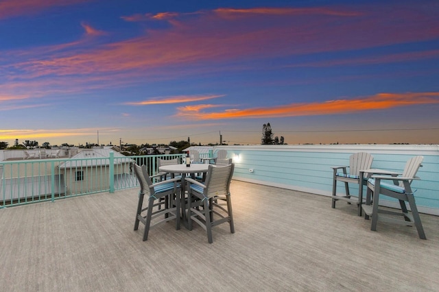 view of patio terrace at dusk