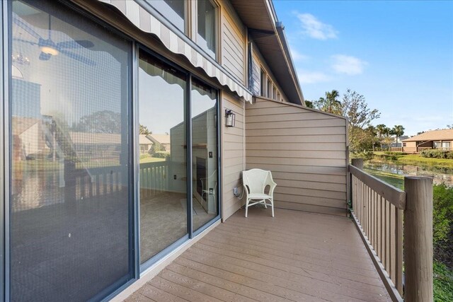 balcony featuring a water view