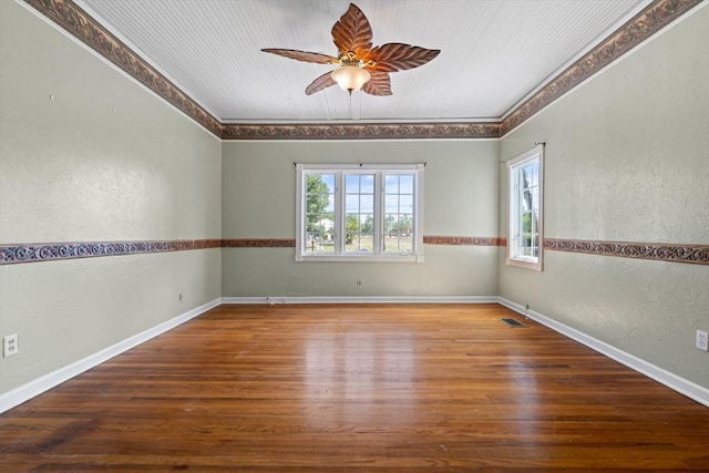 unfurnished room with ceiling fan and wood-type flooring