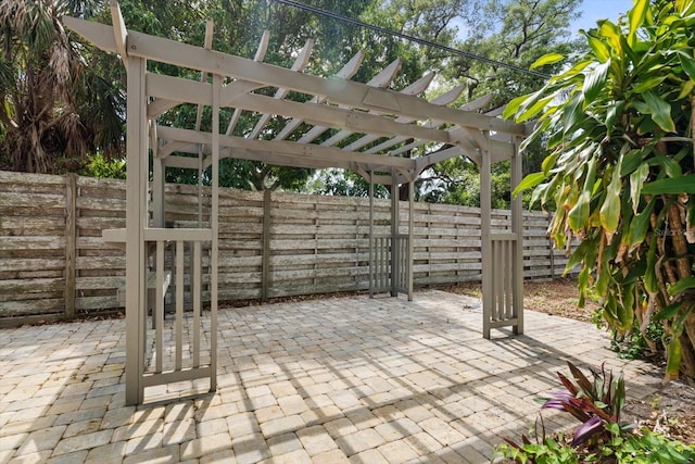 view of patio featuring a pergola