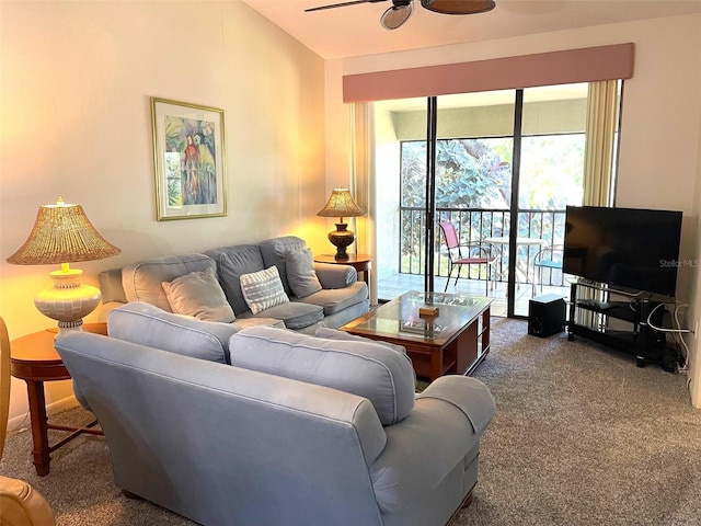 living room featuring lofted ceiling, dark carpet, and ceiling fan