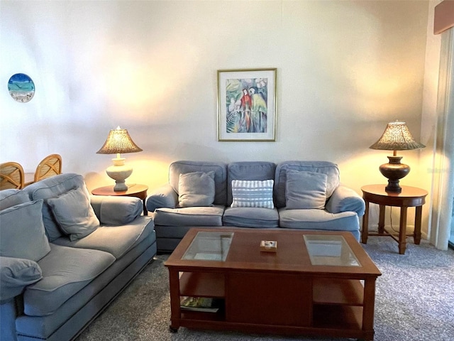 living room featuring dark carpet