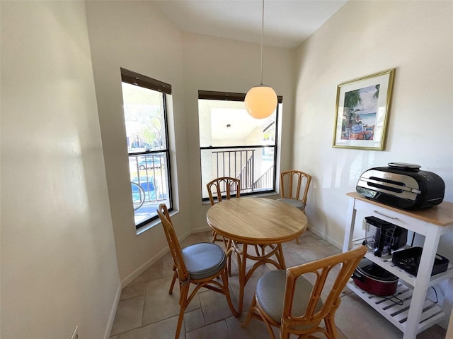 dining room with light tile flooring