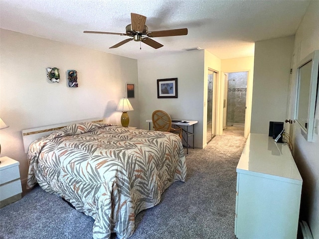 bedroom featuring a closet, ceiling fan, a textured ceiling, ensuite bath, and carpet floors