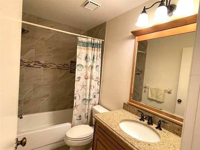 full bathroom featuring vanity, shower / bath combo, and toilet