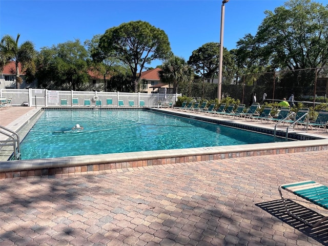 view of pool featuring a patio area