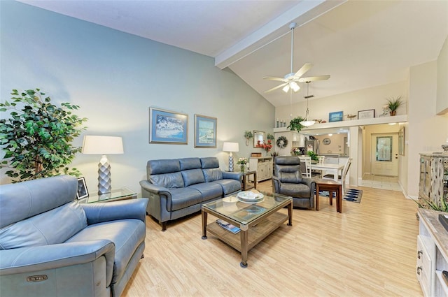 living room featuring beam ceiling, high vaulted ceiling, light hardwood / wood-style floors, and ceiling fan