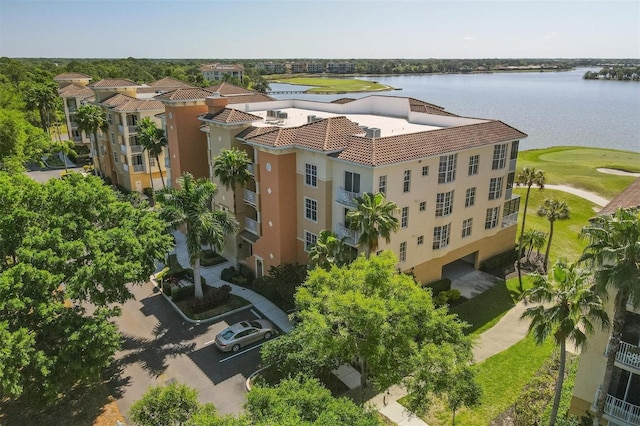 drone / aerial view with a water view