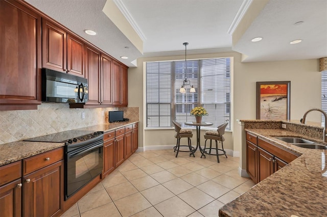 kitchen featuring black appliances, ornamental molding, sink, and stone counters