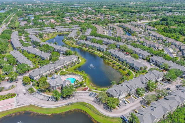 drone / aerial view with a water view