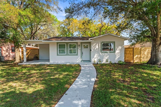 view of front facade with a front lawn