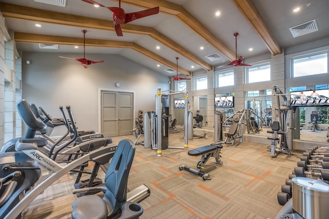 workout area featuring light colored carpet and high vaulted ceiling