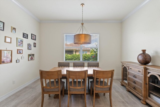 dining area with crown molding