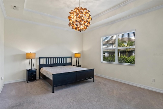 bedroom featuring carpet flooring, an inviting chandelier, a raised ceiling, and ornamental molding