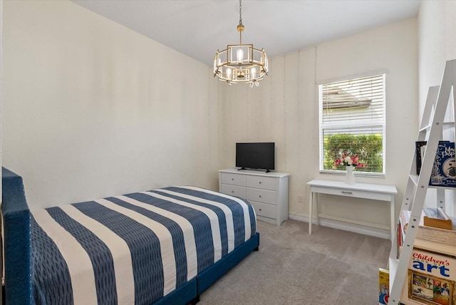 bedroom featuring light colored carpet and a notable chandelier