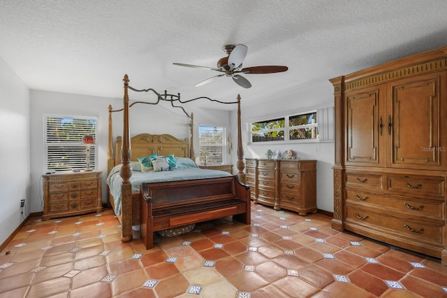 bedroom featuring multiple windows, ceiling fan, and light tile flooring