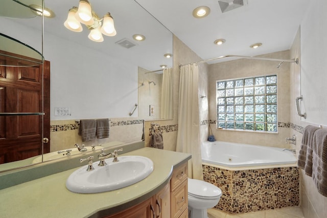 bathroom with toilet, tile floors, and vanity