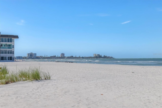 property view of water featuring a beach view