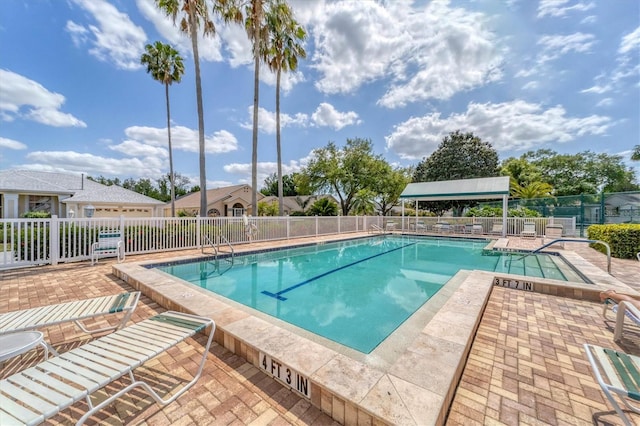 view of pool featuring a patio area