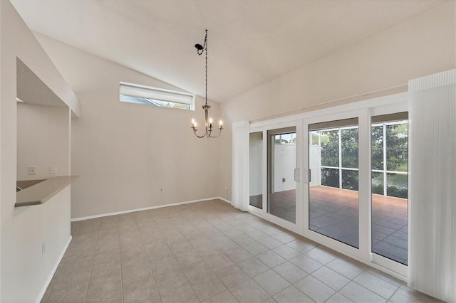 unfurnished dining area featuring a notable chandelier, french doors, high vaulted ceiling, and light tile patterned flooring