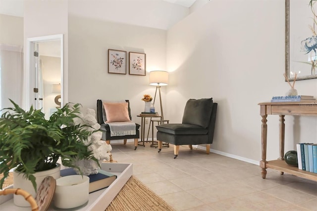 living area with light tile patterned floors