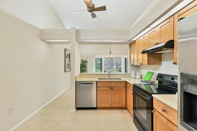 kitchen featuring sink, ceiling fan with notable chandelier, decorative light fixtures, and stainless steel appliances