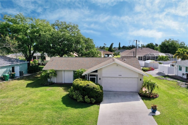 ranch-style house with a front lawn and a garage