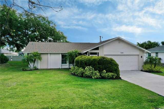 ranch-style house with a front yard and a garage