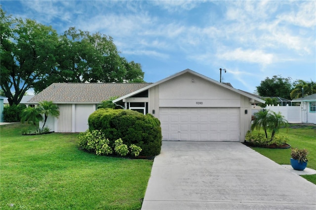 single story home with a front lawn and a garage