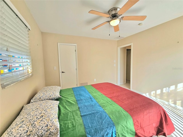 bedroom featuring ceiling fan