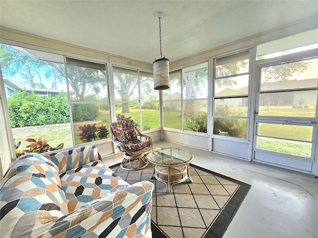 sunroom / solarium featuring a healthy amount of sunlight