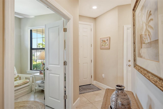 entryway featuring light tile floors