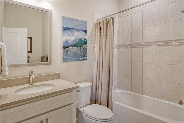 full bathroom featuring shower / bath combo, toilet, and vanity